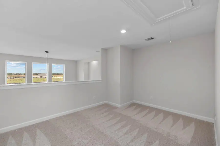 The upstairs gameroom / loft area offers additonal living spaces that can be used as a playroom, game room, or tv room. The upstairs gameroom / loft area offers additonal living spaces that can be used as a playroom, game room, or tv room.