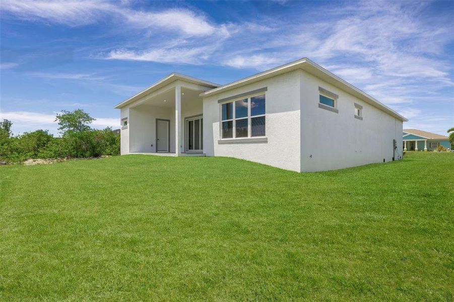 Exterior details and patio area of a home in , Port Charlotte (Image 36).