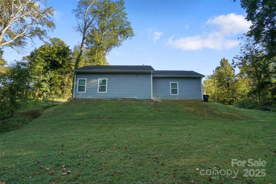 Exterior details and patio area of a home in , Charlotte (Image 1).