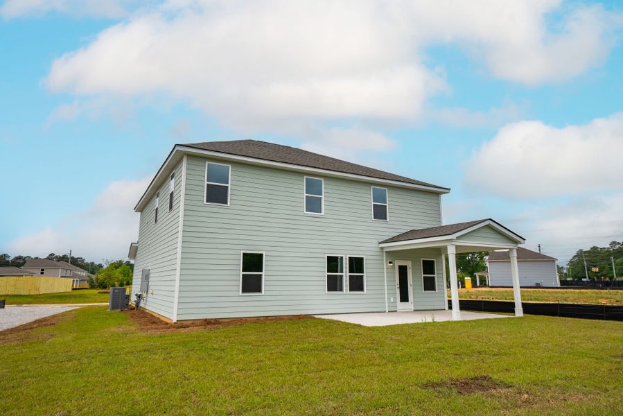 Exterior details and patio area of a home in Monroe Preserve, Chapin (Image 28).