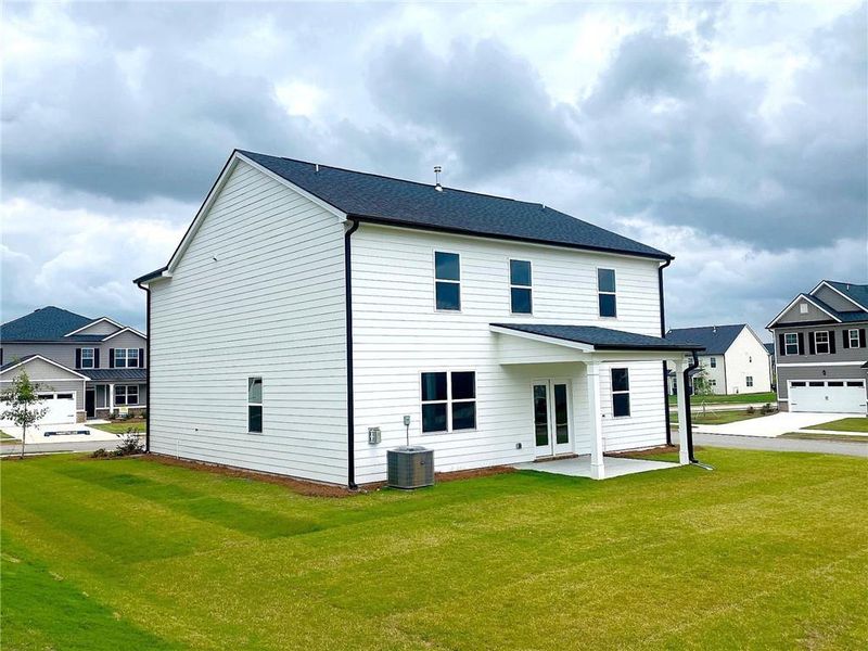Front exterior of a new home in Preserve at Dove Creek, Statham, GA, highlighting curb appeal (Image 29).