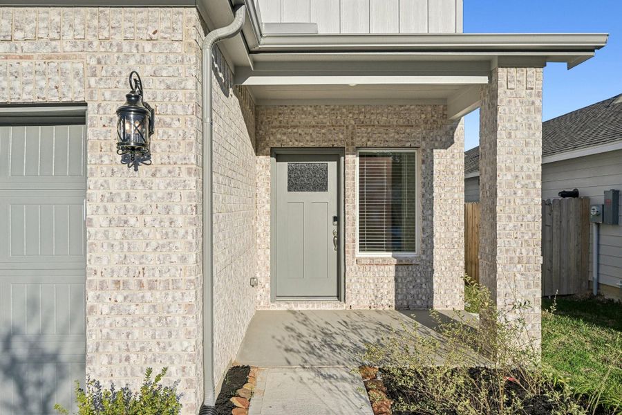 Exterior details and patio area of a home in Landing Meadows - Traditional Series, New Caney (Image 3). Exterior details and patio area of a home in Landing Meadows - Traditional Series, New Caney (Image 3).