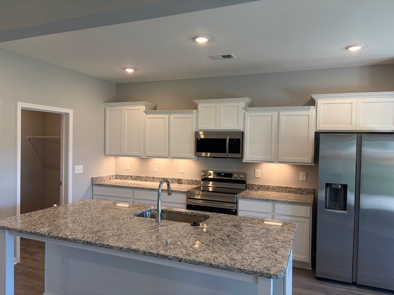 Furnished interior view inside a new home in Cumberland Estates, Fairview (Image 4).