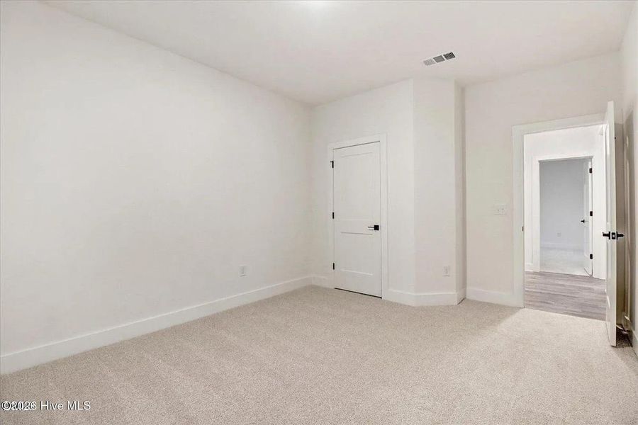 Spacious, unfurnished interior of a new home in East Lake, Leland (Image 13).