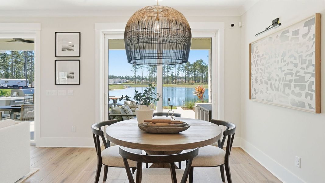 Representative furnished interior of a home built from the Mystique by Del Webb in Del Webb Point Hope, Charleston (Image 11).