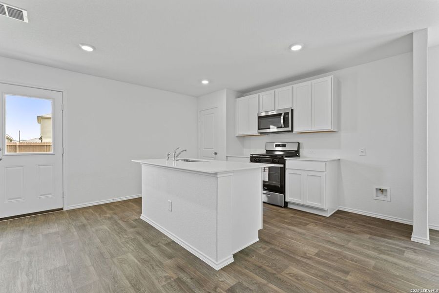 Furnished interior view inside a new home in Avenida, Converse (Image 7).