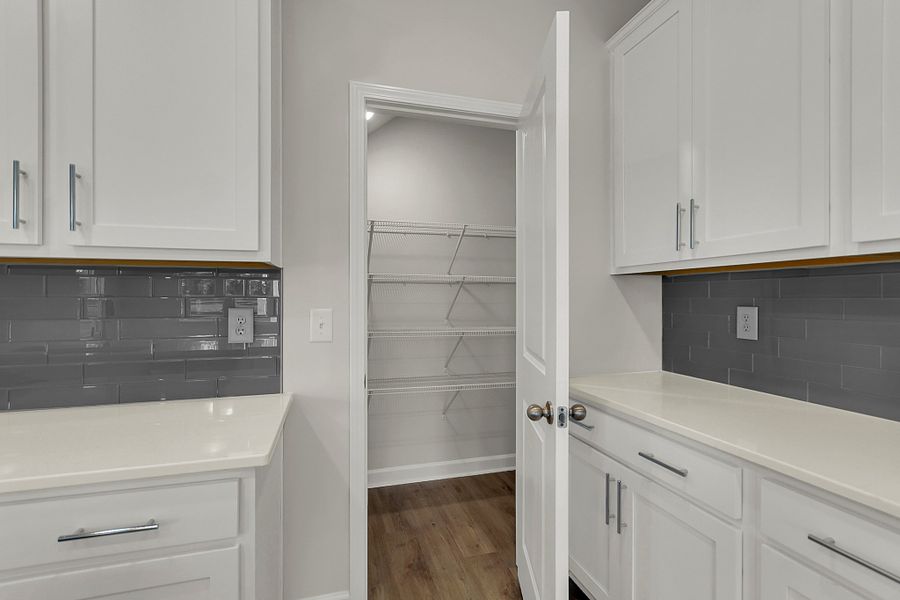 Representative furnished interior of a home built from the Washington by Ashton Woods in Trieste at Bella Vita, Myrtle Beach (Image 8).