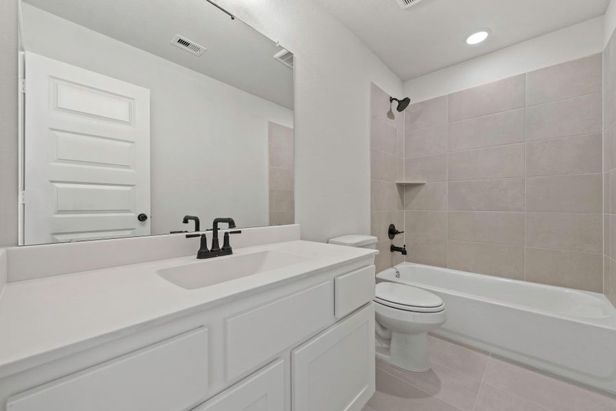 Furnished interior view inside a new home in Legacy, League City (Image 5).