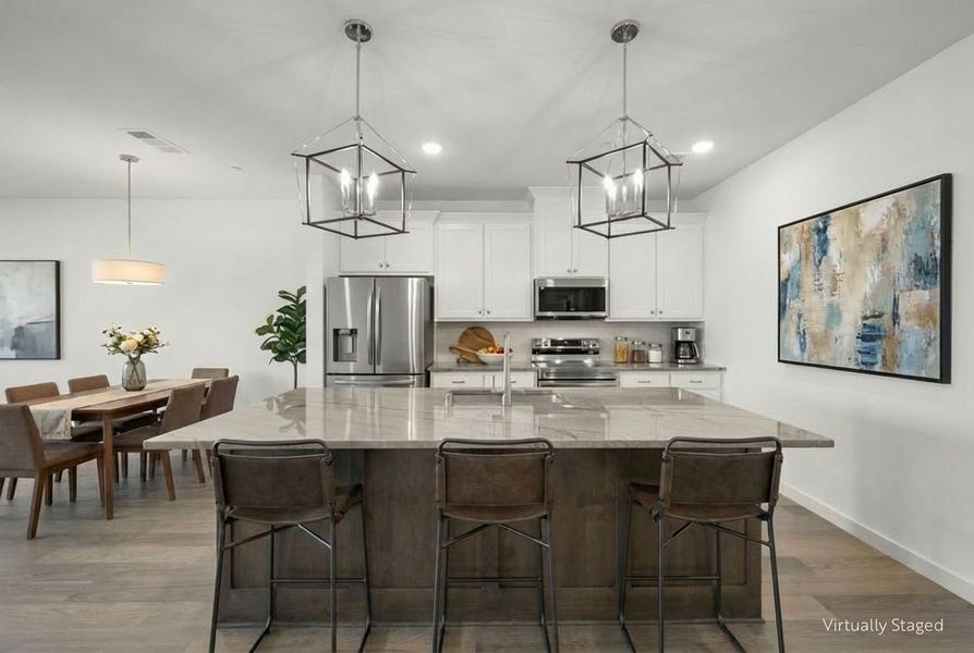Furnished interior view inside a new home in Wildridge, Oak Point (Image 5).