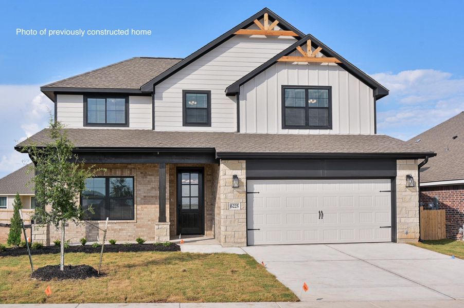 Front exterior of a new home in , College Station, TX, highlighting curb appeal (Image 1).