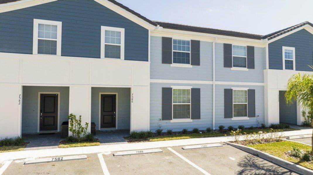 Front exterior of a new home in , Davenport, FL, highlighting curb appeal (Image 18). Front exterior of a new home in , Davenport, FL, highlighting curb appeal (Image 18).