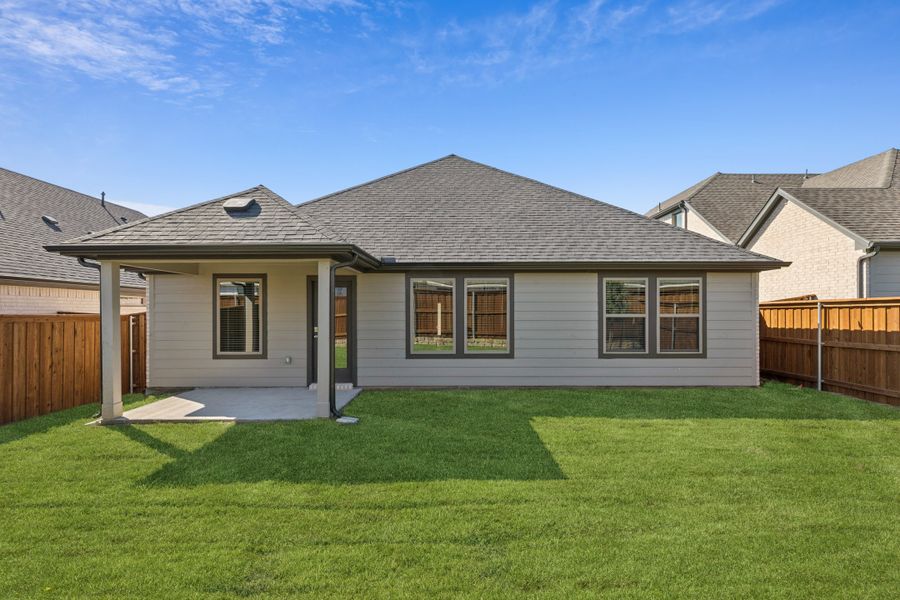 Covered Patio in the Emmy II home plan by Trophy Signature Homes - REPRESENTATIVE PHOTO Covered Patio in the Emmy II home plan by Trophy Signature Homes - REPRESENTATIVE PHOTO