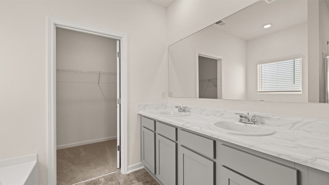 Representative furnished interior of a home built from the Belfort by D.R. Horton in Locust Grove Station - Cedar Ridge, Locust Grove (Image 8).