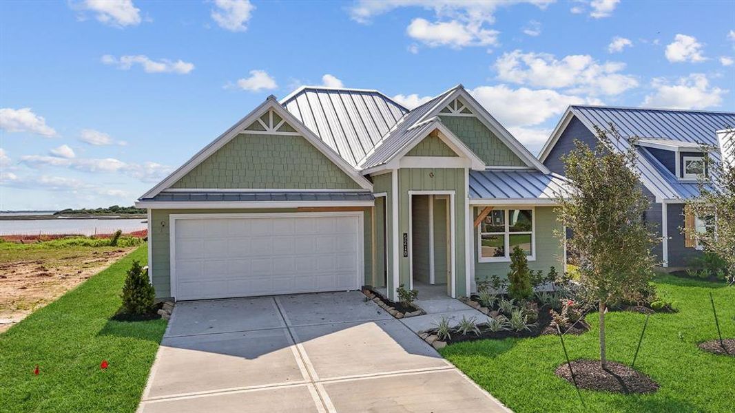 Front exterior of a new home in Grand Cay Harbour, Texas City, TX, highlighting curb appeal (Image 20). Front exterior of a new home in Grand Cay Harbour, Texas City, TX, highlighting curb appeal (Image 20).
