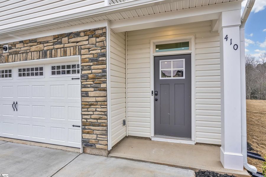 Exterior details and patio area of a home in Sedona, Greenville (Image 3).