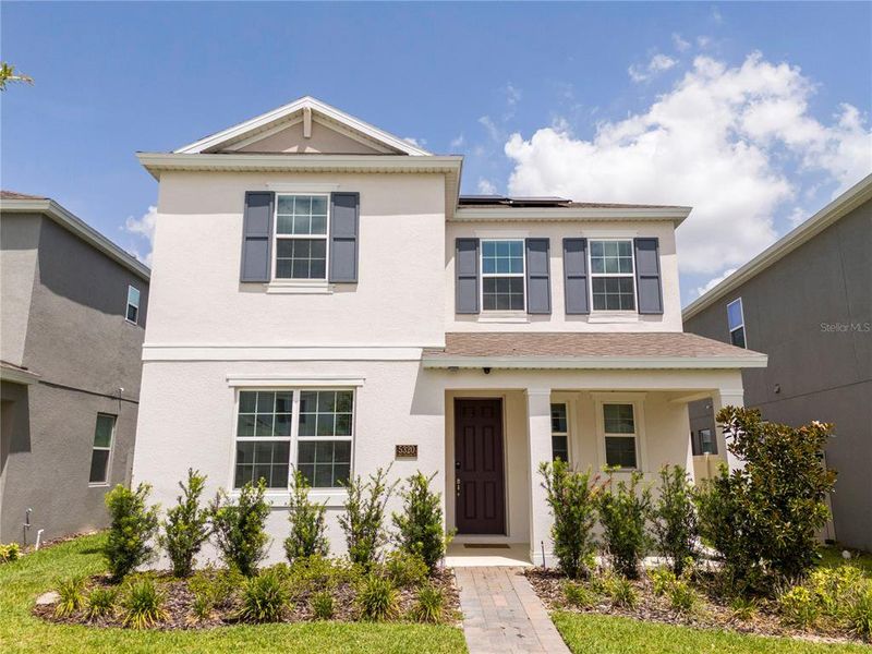 Front exterior of a new home in , Winter Garden, FL, highlighting curb appeal (Image 1). Front exterior of a new home in , Winter Garden, FL, highlighting curb appeal (Image 1).