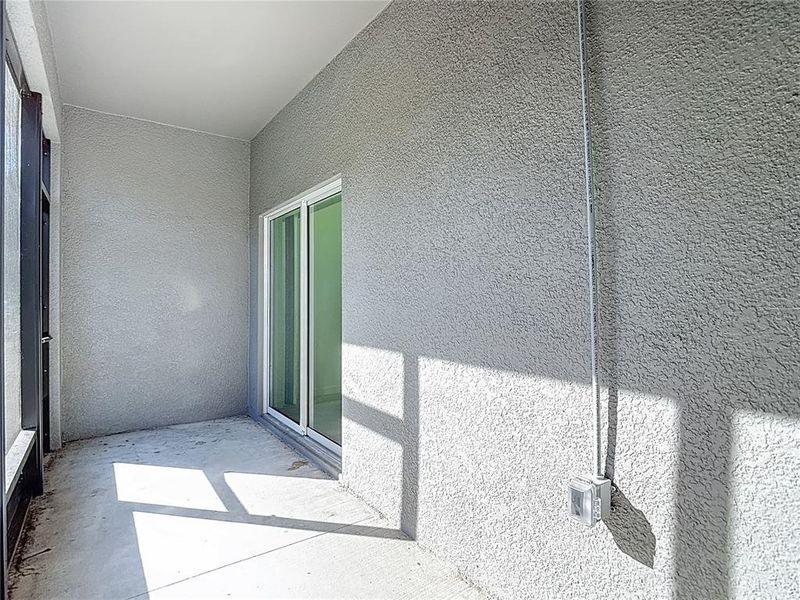 Exterior details and patio area of a home in , Land O' Lakes (Image 17).