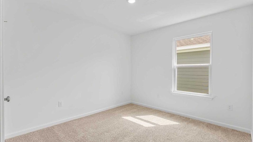 Spacious, unfurnished interior of a new home in Magnolia at the Bluffs Phase 3, Freeport (Image 19). Spacious, unfurnished interior of a new home in Magnolia at the Bluffs Phase 3, Freeport (Image 19).