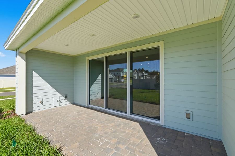 Exterior details and patio area of a home in Headwaters at Lofton Creek, Yulee (Image 3). Exterior details and patio area of a home in Headwaters at Lofton Creek, Yulee (Image 3).