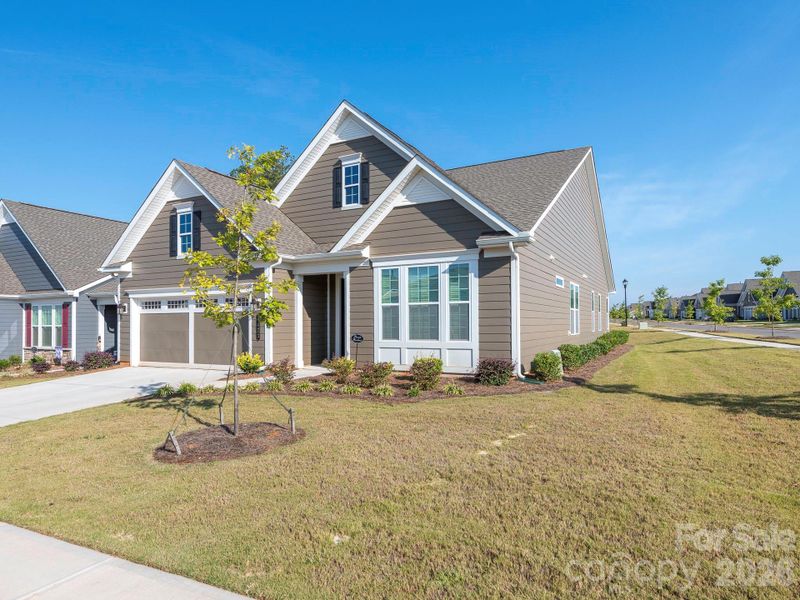 Front exterior of a new home in , Charlotte, NC, highlighting curb appeal (Image 1). Front exterior of a new home in , Charlotte, NC, highlighting curb appeal (Image 1).