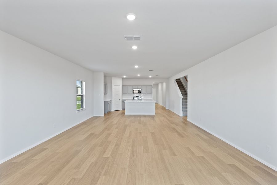 Open First Floor in the Holden home plan by Trophy Signature Homes – REPRESENTATIVE PHOTO Open First Floor in the Holden home plan by Trophy Signature Homes – REPRESENTATIVE PHOTO