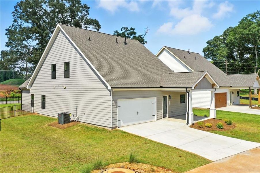 Front exterior of a new home in Ferguson Corners, Emerson, GA, highlighting curb appeal (Image 16).