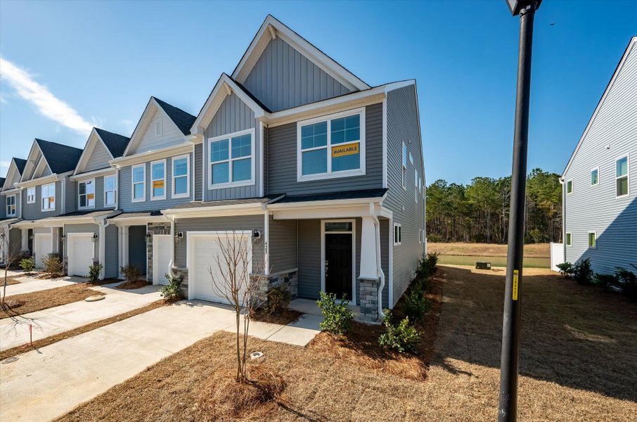 Front exterior of a new home in The Landings at Montague, Goose Creek, SC, highlighting curb appeal (Image 27).