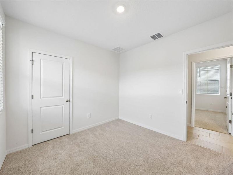 Spacious, unfurnished interior of a new home in Coasterra - Premier Series, Palmetto (Image 17). Spacious, unfurnished interior of a new home in Coasterra - Premier Series, Palmetto (Image 17).