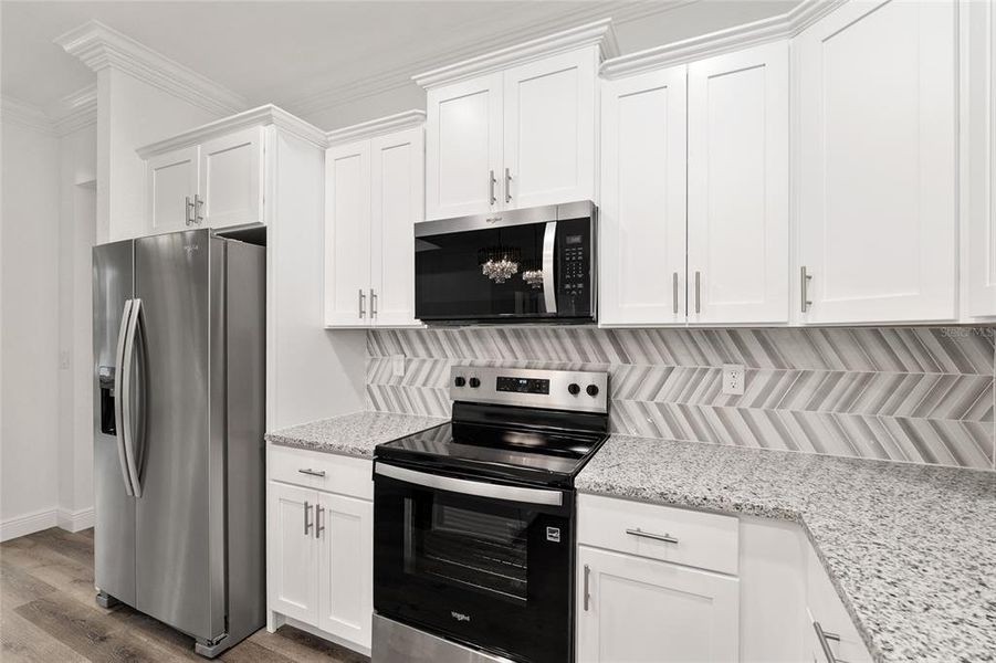 Furnished interior view inside a new home in , Dunnellon (Image 6).