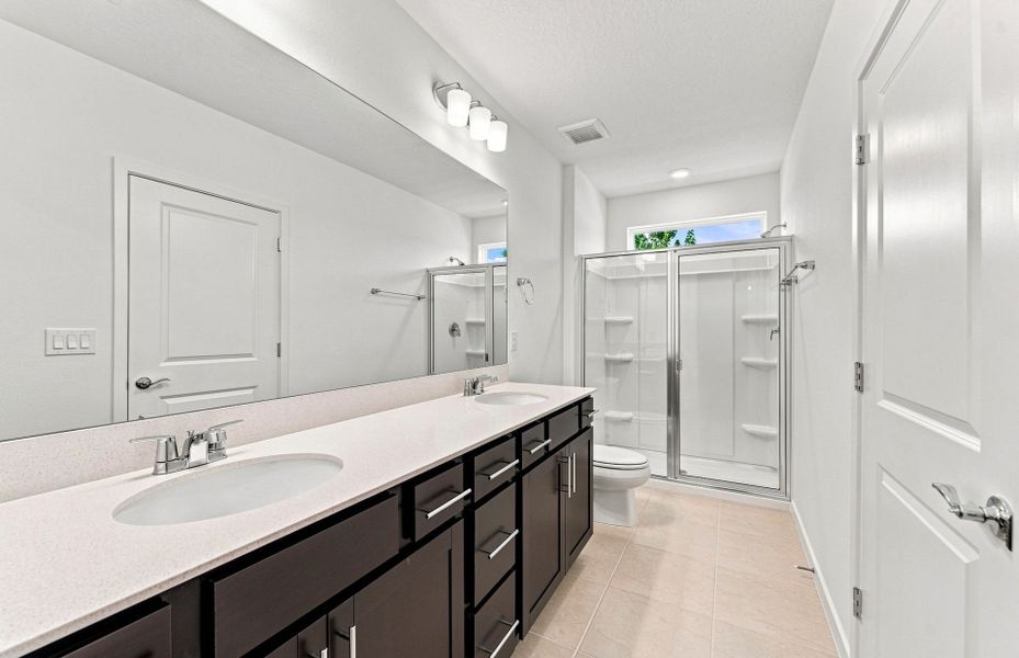 Furnished interior view inside a new home in Twisted Oaks, Wildwood (Image 9).