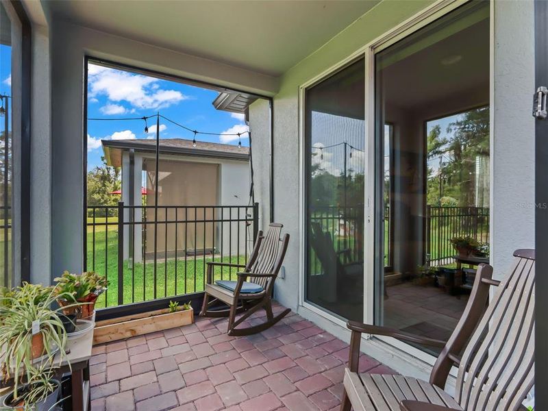 Exterior details and patio area of a home in Fox Pointe at Rivers Edge, Leesburg (Image 3).
