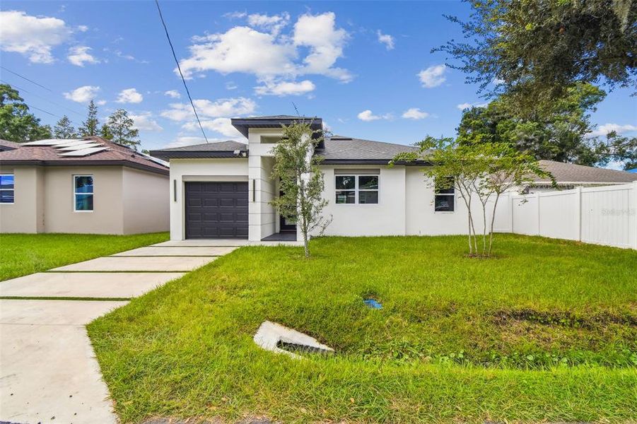 Front exterior of a new home in , Tampa, FL, highlighting curb appeal (Image 28).
