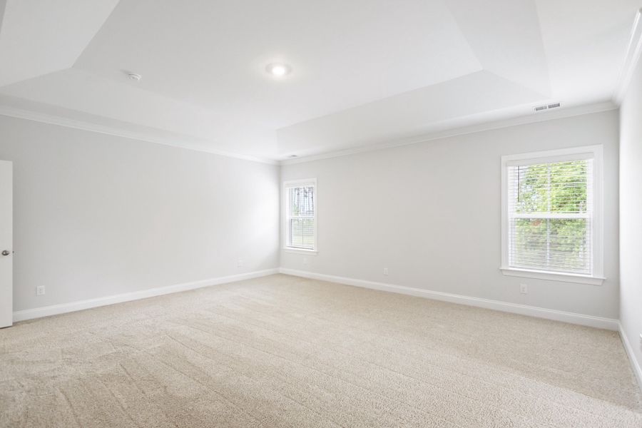 Spacious, unfurnished interior of a new home in Tidewater at Lakes of Cane Bay, Summerville (Image 53).