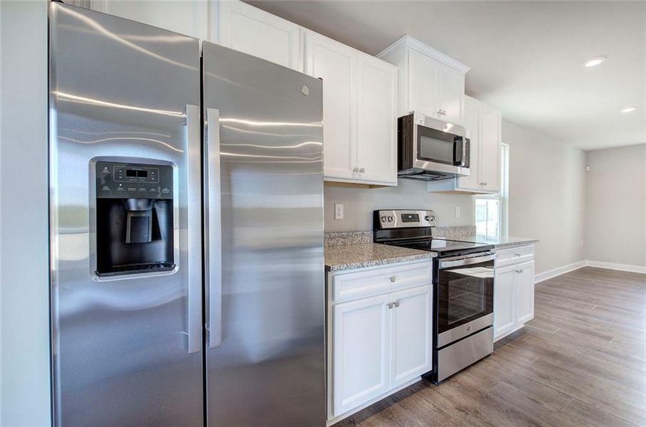 Furnished interior view inside a new home in Serenity 55+, Dallas (Image 11).