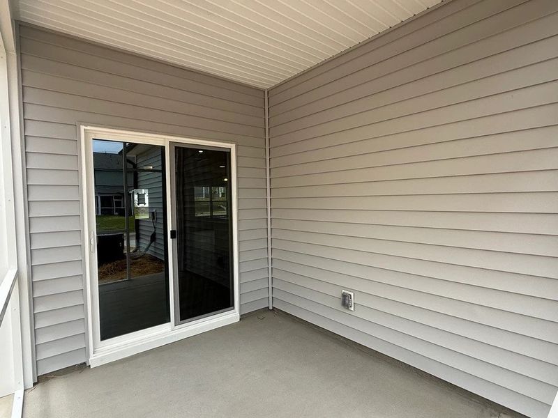 Exterior details and patio area of a home in The Point, Rolesville (Image 3).