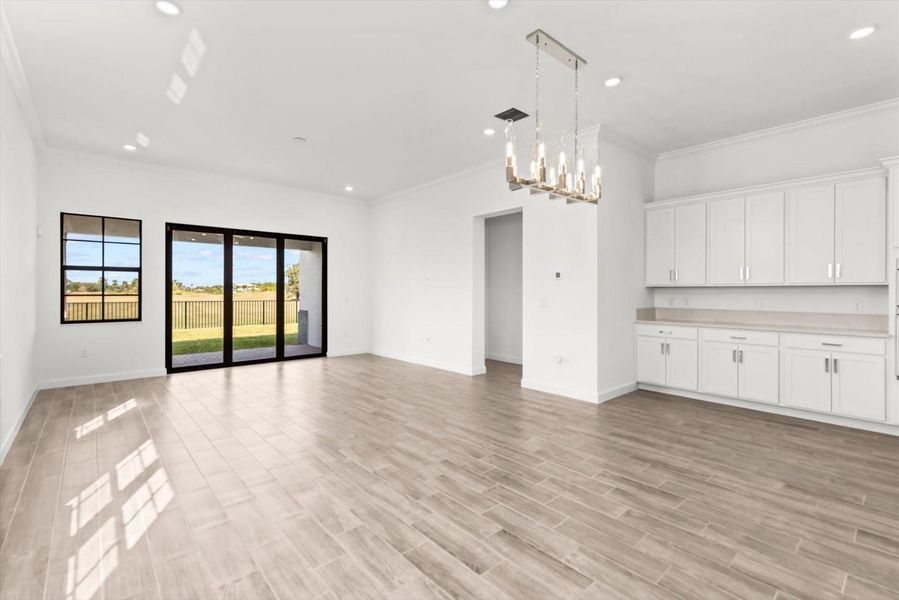 Furnished interior view inside a new home in Tesoro Club, Port St. Lucie (Image 17).