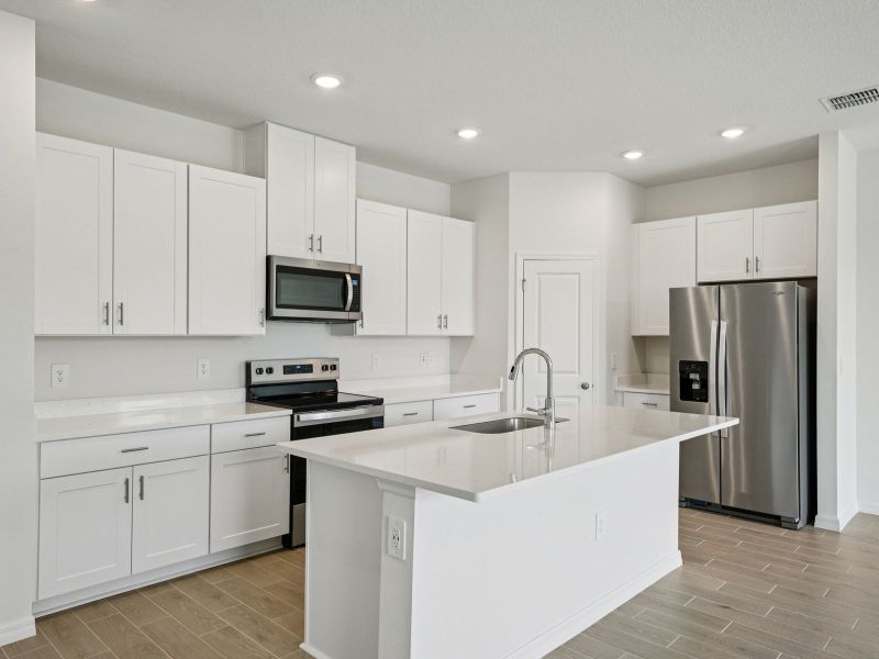 Furnished interior view inside a new home in Two Rivers - Classic Series, Zephyrhills (Image 6).