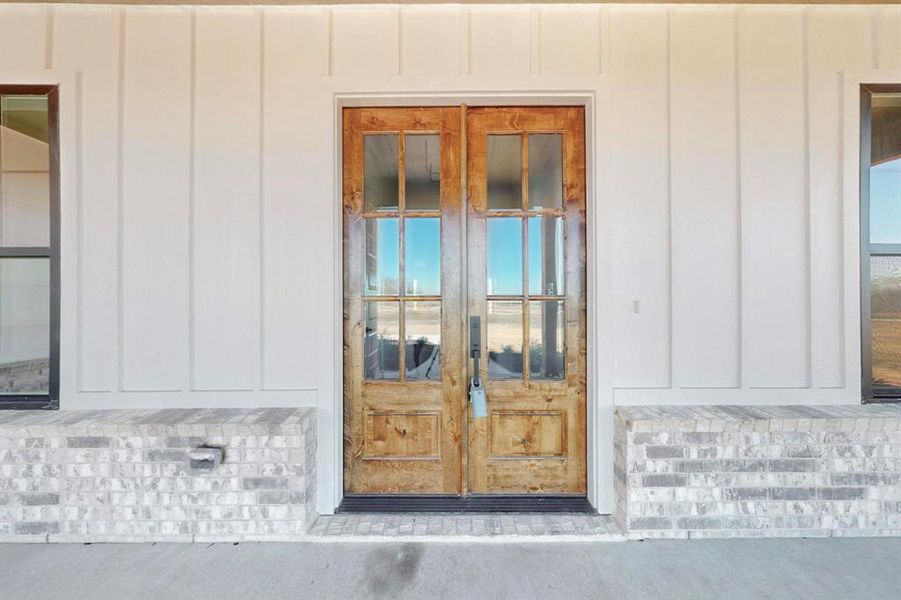 View of exterior entry with french doors