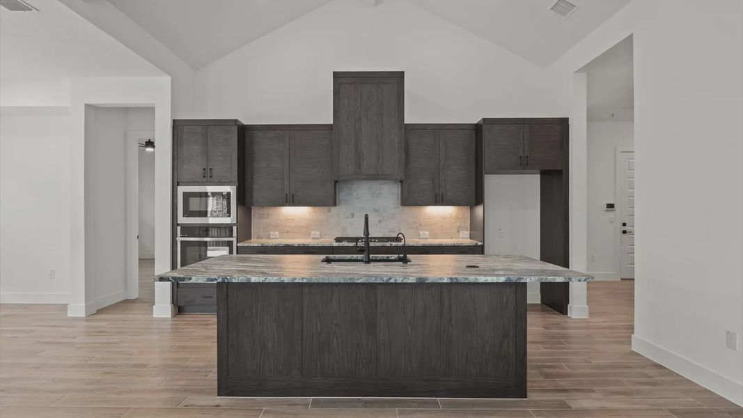 Furnished interior view inside a new home in 6 Creeks, Kyle (Image 4).