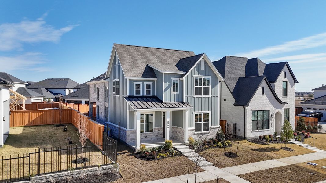 Front exterior of a new home in Fields - 40' Lots, Frisco, TX, highlighting curb appeal (Image 20). Front exterior of a new home in Fields - 40' Lots, Frisco, TX, highlighting curb appeal (Image 20).