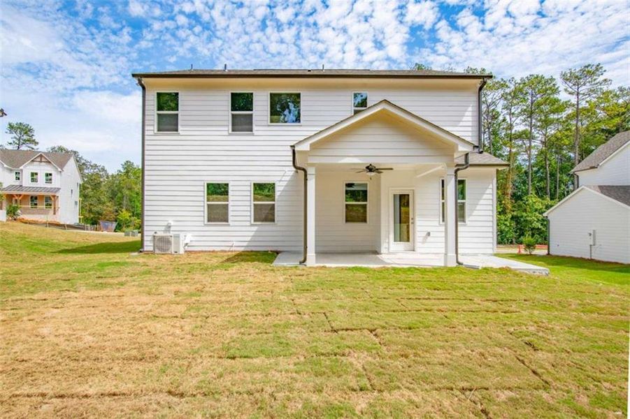 Exterior details and patio area of a home in The Paddocks at Doc Hughes, Buford (Image 2).
