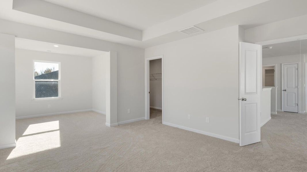 Spacious, unfurnished interior of a new home in The Haven at Indigo Preserve, Leland (Image 31).