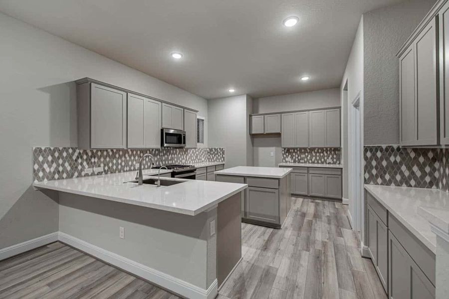 Representative furnished interior of a home built from the Shenandoah – 50′ Lot by Chesmar Homes in Elyson, Katy (Image 4).