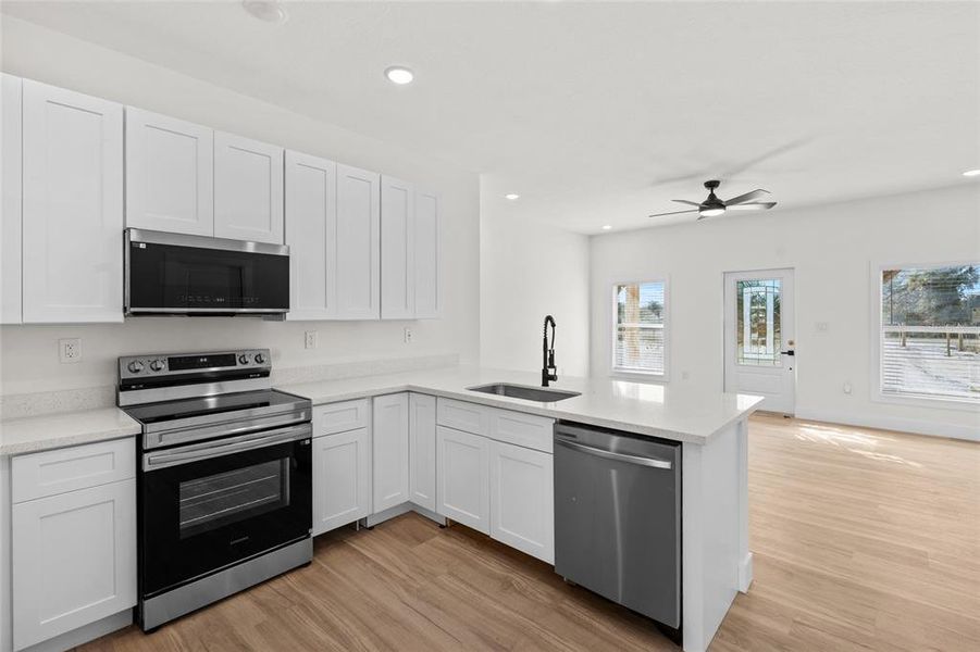 Furnished interior view inside a new home in , Okeechobee (Image 8).