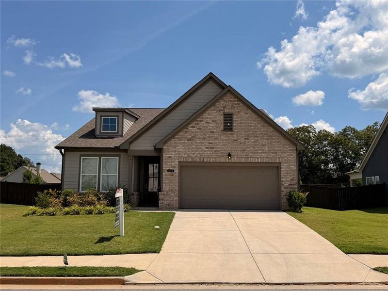 Front exterior of a new home in Wehunt Meadows, Hoschton, GA, highlighting curb appeal (Image 23).