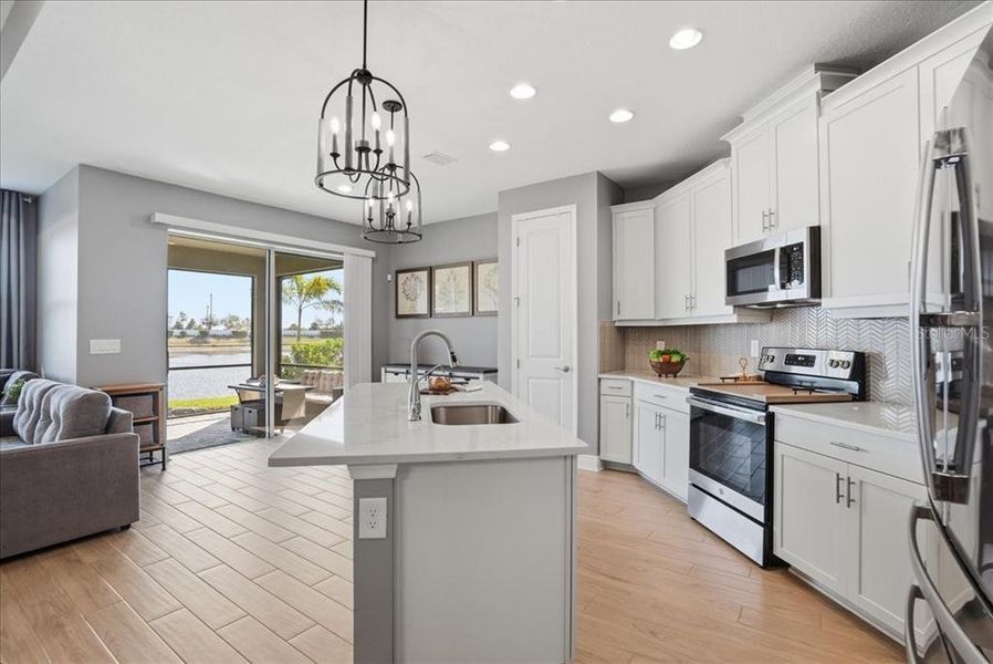 Furnished interior view inside a new home in Cypress Glen at River Wilderness, Parrish (Image 19).