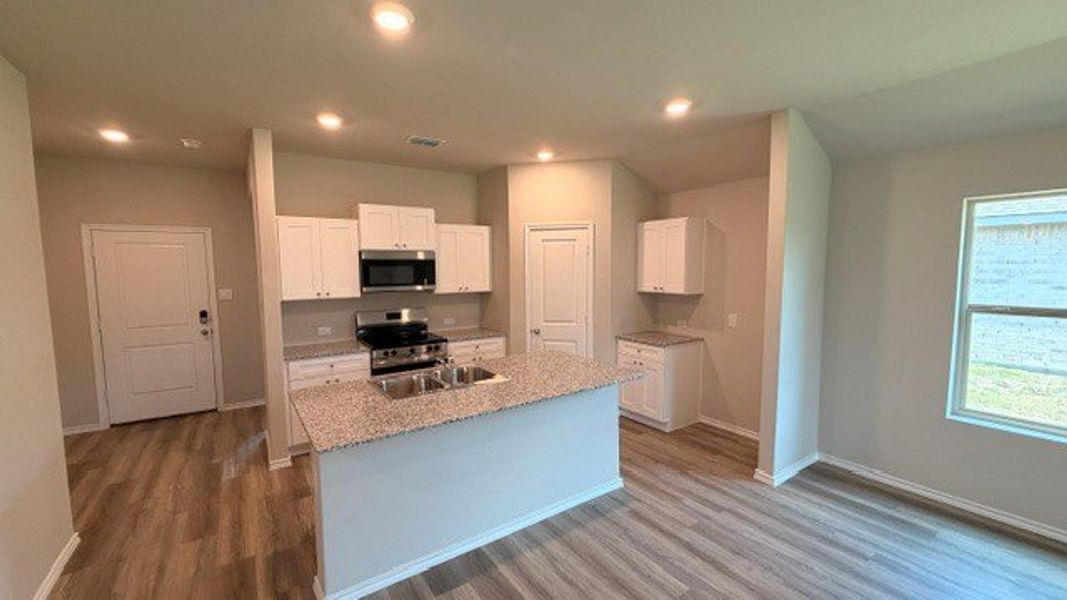 Furnished interior view inside a new home in Sandy Beach, Azle (Image 3).