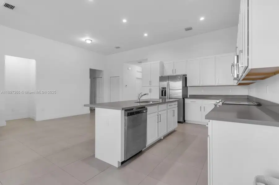 Furnished interior in a model home at Century Royal Homes in Homestead (Image 8).