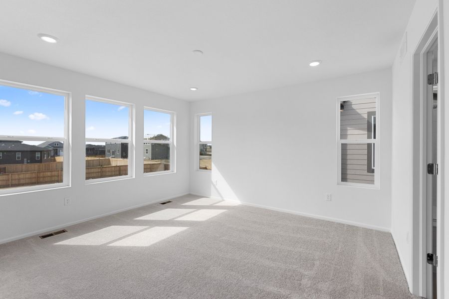 Spacious, unfurnished interior of a new home in The Cottages Collection at Ridgeline Vista, Brighton (Image 14).