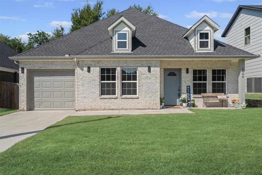 Front exterior of a new home in , Granbury, TX, highlighting curb appeal (Image 2). Front exterior of a new home in , Granbury, TX, highlighting curb appeal (Image 2).